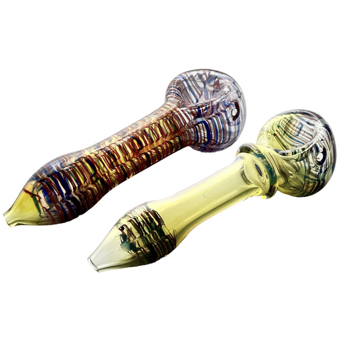 Two hand-blown glass water pipes on a plain white background, one with a multicolor striped pattern and the other with a translucent yellow body and dark green/black swirls.